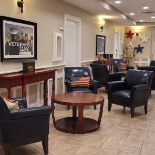 A comfortable waiting area with seating and decor.