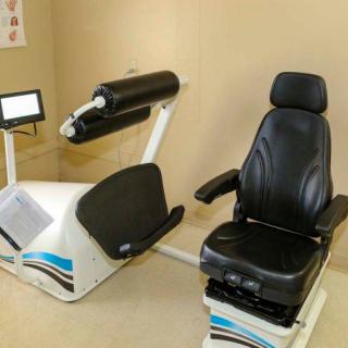 A specialized exercise machine used for rehabilitation and fitness therapy.
