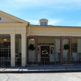 A charming residential building with a welcoming entrance and well-maintained facade.