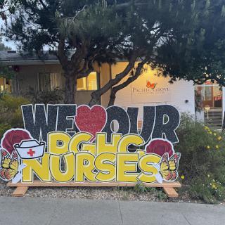 A colorful sign expressing love and appreciation for nurses.