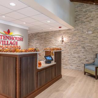 A welcoming reception area with a desk and seating.