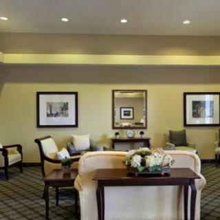 A well-decorated lobby with comfortable seating and elegant decor.