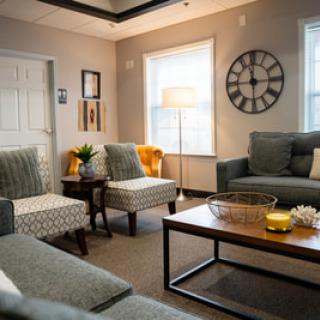 Cozy living room with comfortable seating and stylish decor.
