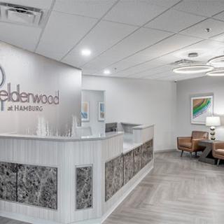 A modern reception area featuring a sleek design with comfortable seating.