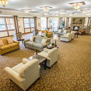 Spacious lobby with comfortable seating and elegant decor.
