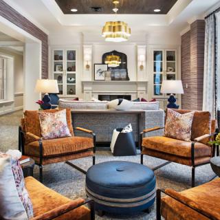 A stylish and modern living room with comfortable seating and elegant decor.