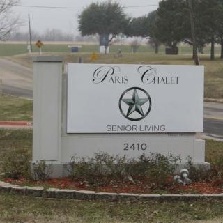 Entrance sign for a senior living facility named Park Creek Senior Living.