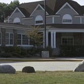 A suburban residential building with a well-maintained exterior.
