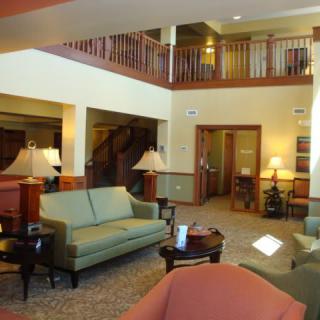 A welcoming hotel lobby with comfortable seating and elegant decor.