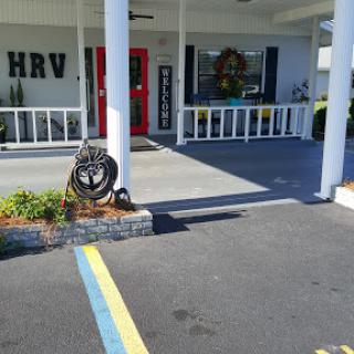 Entrance of a building with decorative elements and a welcoming atmosphere.