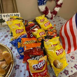 A festive arrangement of various snack chips for a celebration.