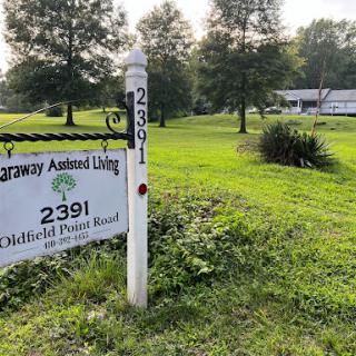A sign indicating the location of a residential assisted living facility.