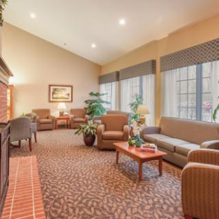 A cozy and inviting lobby area with comfortable seating and natural light.