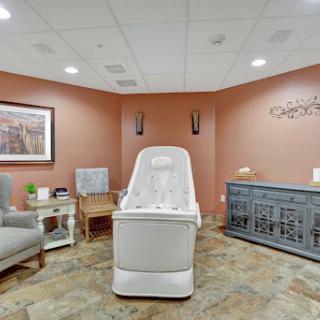 A serene and inviting spa treatment room, designed for relaxation and rejuvenation.