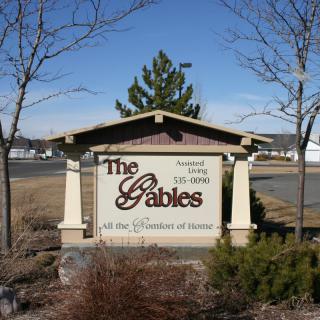Entrance sign for 'The Gables' community.