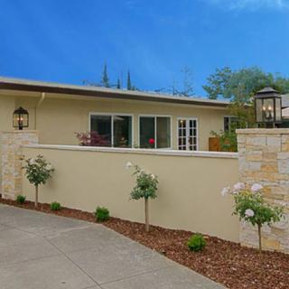 A modern residential house with a well-maintained exterior and landscaping.