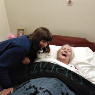 A joyful moment between two people sharing laughter.
