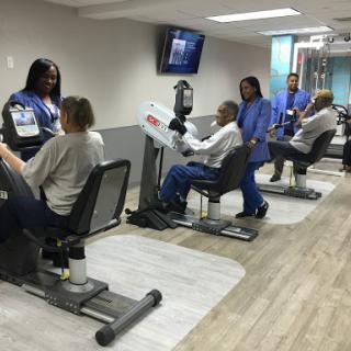 Patients participating in a physical therapy session at a rehabilitation center.