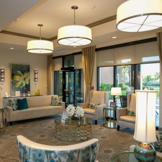 A modern lobby area with comfortable seating and elegant lighting.