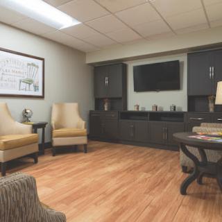 A modern and inviting waiting area featuring comfortable seating and minimalist decor.