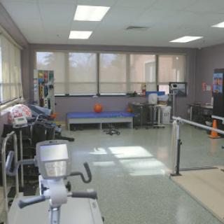A well-equipped physical therapy room designed for rehabilitation exercises.