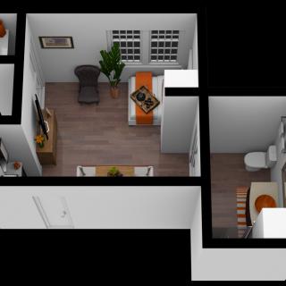 A 3D floor plan depicting a cozy apartment with a living area, bedroom, and bathroom.