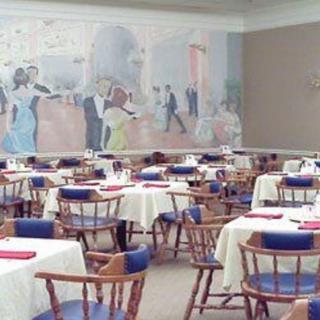 An elegant restaurant dining area with neatly arranged tables and chairs, featuring a large mural on the wall.