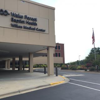 Exterior view of a healthcare facility with clear signage.
