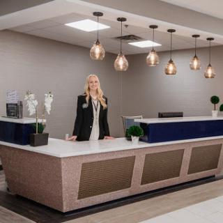 A welcoming hotel reception area with a modern design and friendly staff.