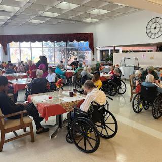 Residents enjoying a communal activity at a nursing home.
