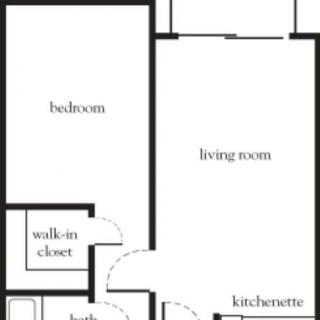 A floor plan of an apartment featuring a bedroom, living room, walk-in closet, and kitchenette.