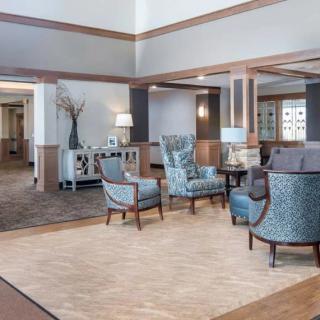 A modern lobby area with elegant furnishings and lighting.