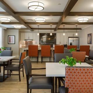 A modern dining area with stylish seating and contemporary lighting.