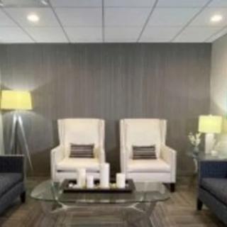 A modern lobby with comfortable seating and stylish decor.