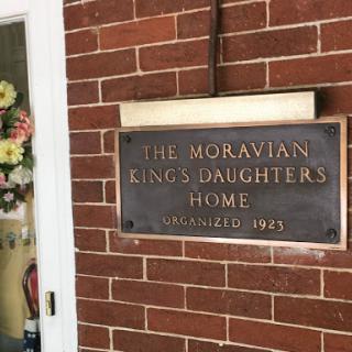 The sign for The Moravian Kings Daughters Home, established in 1875.