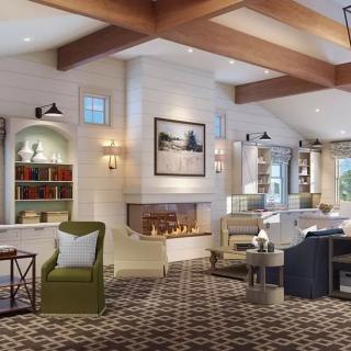 A cozy living room with a fireplace and stylish decor.