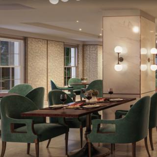 A stylish restaurant interior featuring modern decor with green chairs and elegant lighting.