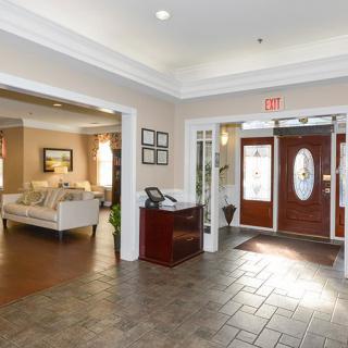 A welcoming lobby area with comfortable seating and a reception desk.