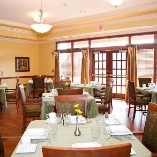 A cozy and elegantly designed dining area, perfect for enjoying meals in a relaxed atmosphere.