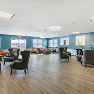 A modern lounge area featuring comfortable seating and a serene atmosphere.