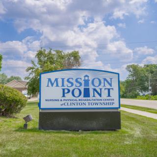 The sign for Mission Point, indicating a welcoming location.