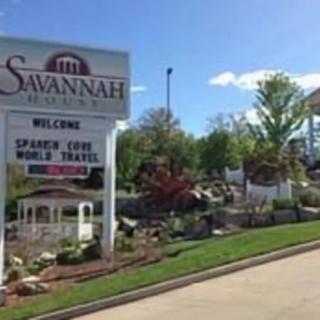 Entrance sign for Savannah community with landscaped surroundings.