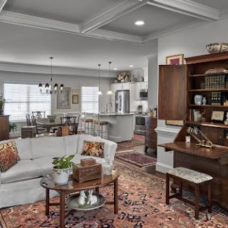 A beautifully designed modern living room featuring a cozy atmosphere with elegant furniture and decor elements.
