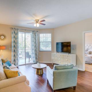 A cozy living room featuring modern furniture, a television, and tasteful decor.