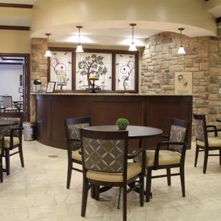 A cozy lobby area with a reception desk and seating arrangement.
