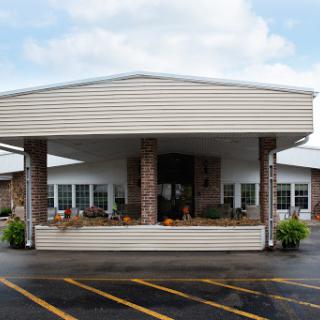 A welcoming entrance to a well-maintained building with a modern design.