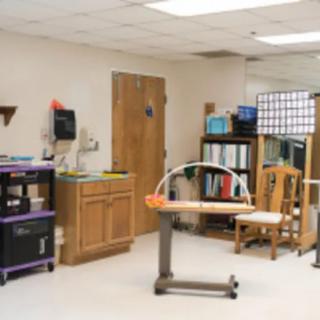 A room equipped for medical therapy and rehabilitation.