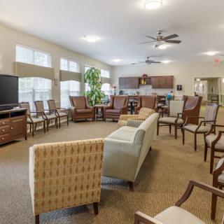 A spacious living area with comfortable seating and modern amenities.