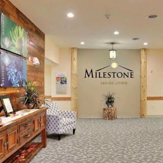 An inviting lobby area featuring cozy seating and decorative elements.