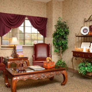 A cozy and stylish living room with elegant furniture and decorative elements.